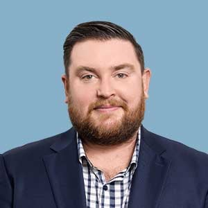Ross-Headshot-Blue-Background